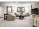 Spacious living room with plush carpeting, neutral walls, and stylish furnishings at 00123 Millstream Dr, China Grove, NC 28023