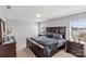 Spacious bedroom with a large dark wood bed, matching nightstands, and a dresser offering comfort and style at 1062 River Haven Sw Ave, Concord, NC 28025