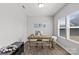 Bright and airy office space with a large window, desk, and stylish decor at 1062 River Haven Sw Ave, Concord, NC 28025
