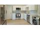 Modern kitchen with white cabinets, subway tile backsplash, and stainless steel appliances at 1104 Norris Ave, Charlotte, NC 28206