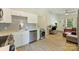 Modern kitchen and living space combo with stainless appliances and hardwood floors at 1104 Norris Ave, Charlotte, NC 28206