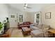 Cozy living room with hardwood floors, comfortable seating, and lots of natural light at 1104 Norris Ave, Charlotte, NC 28206