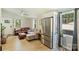 Cozy living room with comfortable seating and lots of natural light and stainless steel fridge at 1104 Norris Ave, Charlotte, NC 28206