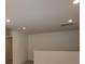 Neutral-toned upstairs space features plush carpeting, recessed lighting, and an open doorway at 1119 Overbrook Pl, Wingate, NC 28174