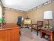Neutral bedroom featuring a desk, chair, accent chair, and artistic touches at 113 Rocky Trail Ct, Fort Mill, SC 29715