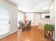 Cozy dining area with wood floors, a dining table, and a view into the kitchen at 113 Rocky Trail Ct, Fort Mill, SC 29715