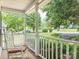 Inviting front porch with rocking chair, perfect for enjoying the neighborhood view at 113 Rocky Trail Ct, Fort Mill, SC 29715