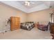 Serene bedroom with tray ceilings, neutral walls, and comfortable furnishings at 113 Rocky Trail Ct, Fort Mill, SC 29715