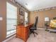 This home office is enhanced by natural light and classic decor, ideal for a productive work environment at 113 Rocky Trail Ct, Fort Mill, SC 29715