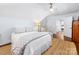 Bright bedroom featuring plantation shutters, hardwood floors and neutral decor at 1209 Yale Pl, Charlotte, NC 28209