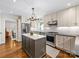 Well-equipped kitchen with stainless steel appliances, a center island, and custom cabinetry at 1209 Yale Pl, Charlotte, NC 28209