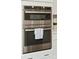 Stainless steel built-in oven and microwave showcasing the modern kitchen appliances at 131 Berkeley Ave # D, Mooresville, NC 28117