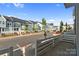 Street view of townhomes with manicured lawns and landscaping; blue skies above at 131 Berkeley Ave # D, Mooresville, NC 28117