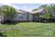 Well-maintained backyard with a large deck and lush green grass at 134 Walmsley Pl, Mooresville, NC 28117