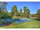 Community tennis courts and playground provide recreational opportunities in a beautiful, landscaped setting at 134 Walmsley Pl, Mooresville, NC 28117