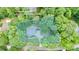 A home with a long driveway in a wooded area, highlighted with lot lines at 141 Culpeze Rd, Mooresville, NC 28117