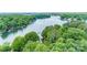 Aerial view of a tranquil lake with several docks and waterfront properties at 141 Culpeze Rd, Mooresville, NC 28117