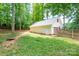 Detached two-car garage with an American flag, surrounded by a well-maintained lawn at 141 Culpeze Rd, Mooresville, NC 28117