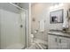 Bathroom features a shower with granite countertop vanity and a window for natural light at 141 Culpeze Rd, Mooresville, NC 28117