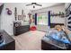 A decorated bedroom featuring carpet, a window, and a ceiling fan at 141 Culpeze Rd, Mooresville, NC 28117