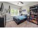 Well decorated bedroom with sports memorabilia, natural light from window and carpeted floors at 141 Culpeze Rd, Mooresville, NC 28117