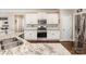 Modern kitchen featuring white cabinets, stainless steel appliances, and granite countertops at 141 Culpeze Rd, Mooresville, NC 28117