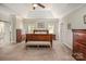 Spacious main bedroom with neutral walls, plush carpet, and traditional-style furniture at 141 Culpeze Rd, Mooresville, NC 28117