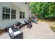 Expansive patio with wicker furniture, flowing into deck area with dining set at 141 Culpeze Rd, Mooresville, NC 28117
