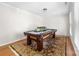 Billiards room offering a pool table with unique light fixture and carpeting at 14812 Stonegreen Ln, Huntersville, NC 28078