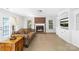 Cozy living room features a brick fireplace, plush sofa, and built-in shelving at 14812 Stonegreen Ln, Huntersville, NC 28078