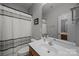 Standard bathroom with a combination toilet and sink and shower with shower curtain at 1508 Peaceful Way Dr, Charlotte, NC 28206