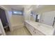 Clean bathroom with double sinks, spacious counter, and modern fixtures at 1508 Peaceful Way Dr, Charlotte, NC 28206