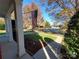 American flag displayed from the front porch of a well-maintained home, showcasing neighborhood views at 1508 Peaceful Way Dr, Charlotte, NC 28206