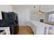 Bright kitchen featuring a large island with a marble countertop and stainless steel appliances at 1508 Peaceful Way Dr, Charlotte, NC 28206