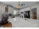 Open-concept kitchen with a large island and stainless-steel appliances at 1508 Peaceful Way Dr, Charlotte, NC 28206