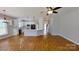 Spacious living room with hardwood floors, an open layout and lots of natural light at 1508 Peaceful Way Dr, Charlotte, NC 28206