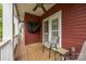 Outdoor porch with ceiling fan, chairs, and access to the home at 1508 Peaceful Way Dr, Charlotte, NC 28206