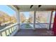 Charming porch with a view of the neighborhood street and plenty of sunlight at 1508 Peaceful Way Dr, Charlotte, NC 28206