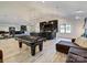 Open game room with a pool table and home bar; a great space for entertaining guests at 1525 Shinnville Rd, Cleveland, NC 27013