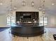 Home bar in the game room features a TV, lighting, and a serving area with lots of storage at 1525 Shinnville Rd, Cleveland, NC 27013