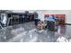 Well-organized garage with epoxy floors and ample storage cabinets for tools and equipment at 1525 Shinnville Rd, Cleveland, NC 27013