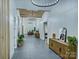 Hallway with neutral tones, wood ceiling accents, and statement lighting at 1525 Shinnville Rd, Cleveland, NC 27013