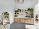 Modern living room featuring built in cabinets, open shelving and rattan chair at 1525 Shinnville Rd, Cleveland, NC 27013