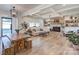 Bright living room featuring a brick fireplace, wood floors, and comfortable seating at 1525 Shinnville Rd, Cleveland, NC 27013
