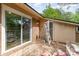 Home backyard patio area with sliding glass doors at 1532 Downs Ave, Charlotte, NC 28205