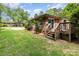 View of backyard and wooden staircase and patio at 1532 Downs Ave, Charlotte, NC 28205