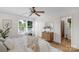 Relaxing main bedroom featuring wood floors, a dresser, and an ensuite bathroom at 1607 Old Lawyers Rd, Marshville, NC 28103