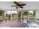 Bright sunroom with furniture, ceiling fan and outdoor views at 1607 Old Lawyers Rd, Marshville, NC 28103