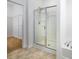 Bathroom features a glass enclosed shower, soaking tub, and large walk in closet at 170 Atwater Landing Dr, Mooresville, NC 28117