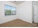 Bedroom with window for natural light and closet for storage at 170 Atwater Landing Dr, Mooresville, NC 28117